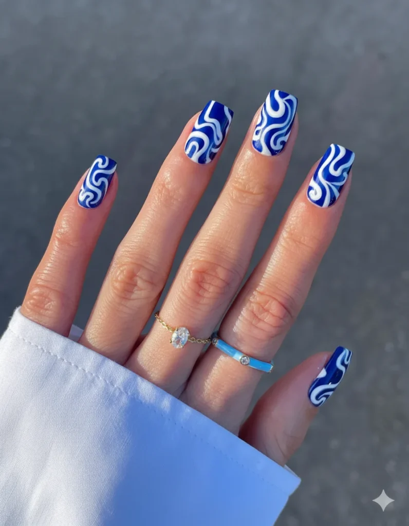 Blue-and-White-Swirl-Nails.webp
