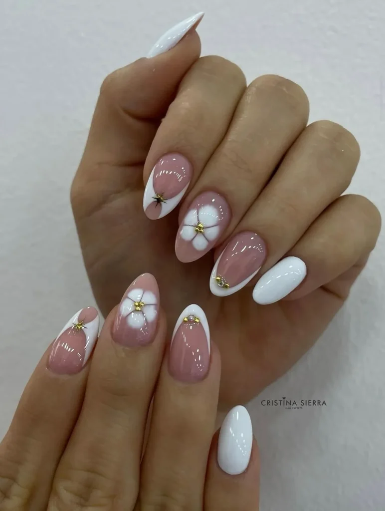 Chic-White-and-Gold-Flower-Nails.webp
