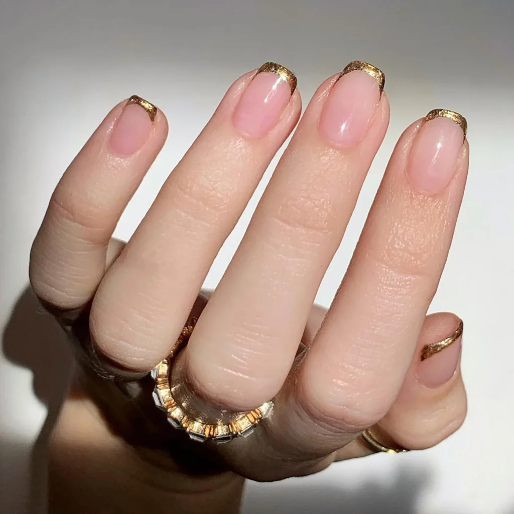 Classic-Nude-with-Gold-French-Tips.webp