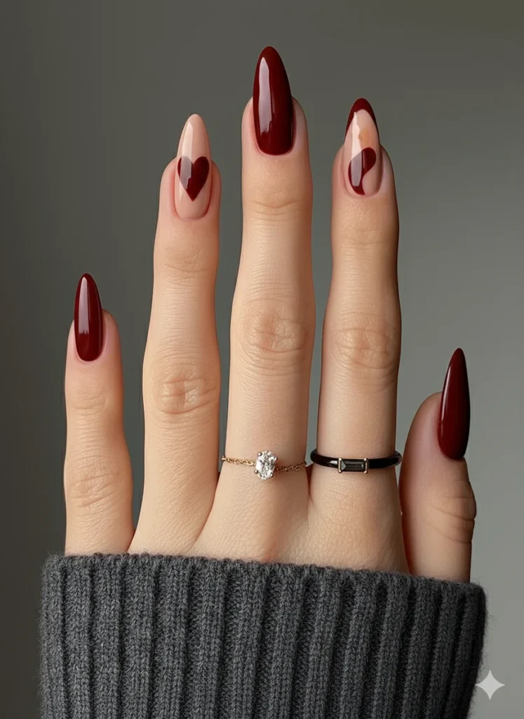 Deep-Red-and-Heart-Detail-Nails.webp
