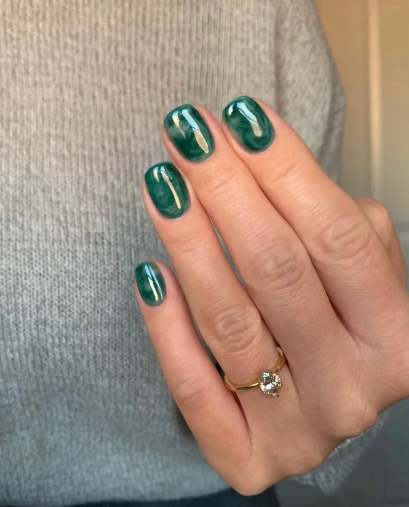 Green-Marble-Nail-Art-with-Gold-Detailing.webp
