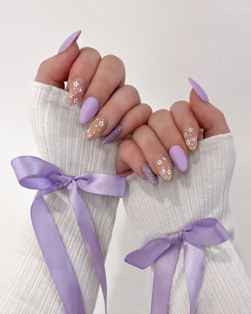 Lavender-and-Glitter-Nails-with-Floral-Touch.webp

