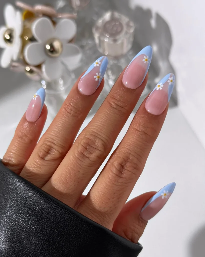 Soft-Blue-and-Pink-French-Tips-with-Floral-Accent.webp
