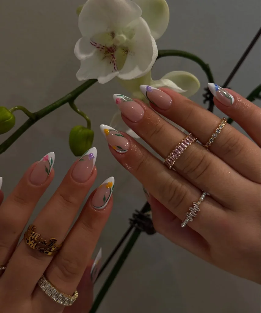 Vibrant-Floral-French-Tip-Nails.webp
