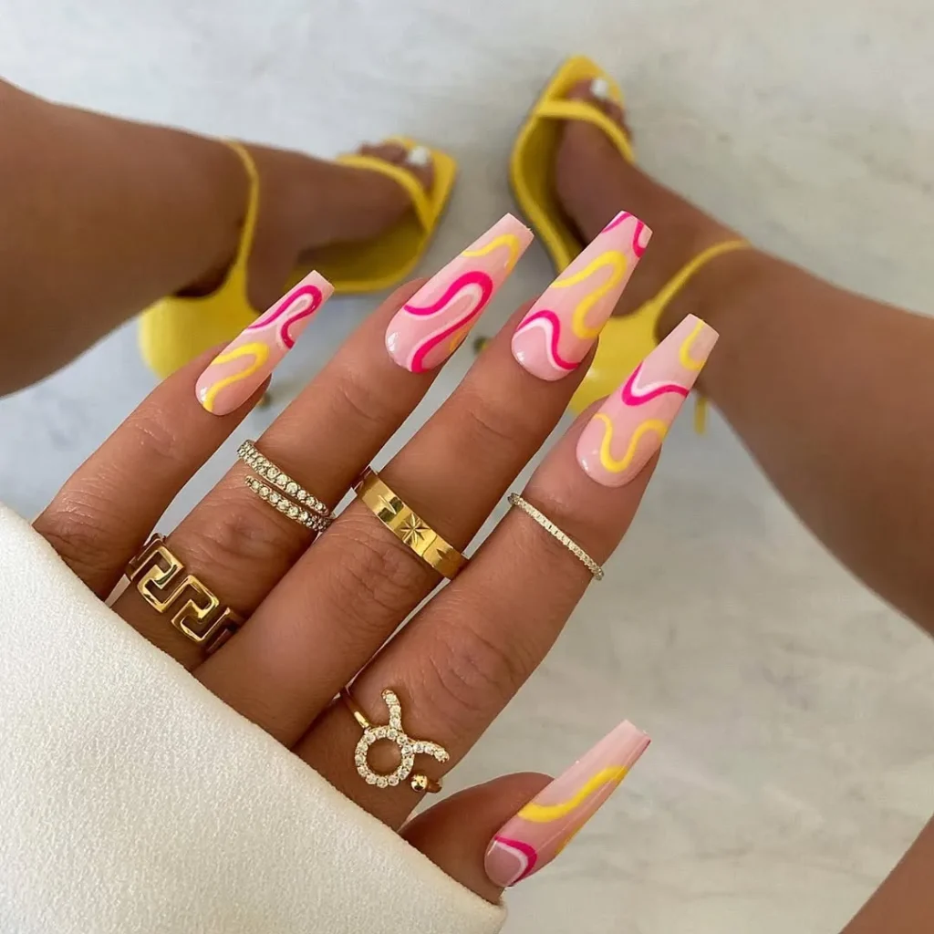 Press-On-Long-Nails-with-Pink-and-Yellow-Swirls.webp